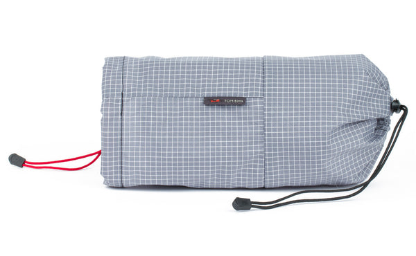 An Aeronaut 30 Travel Laundry Stuff Sack in Northwest Sky (light grey with white grid) 200 Halcyon.